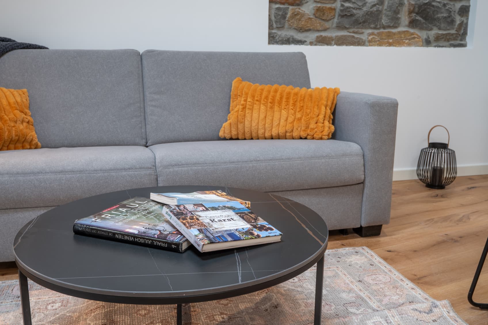 Pictured is the sofa in the Comfy Apartment that can be turned into an extra bed for up to 2 people.