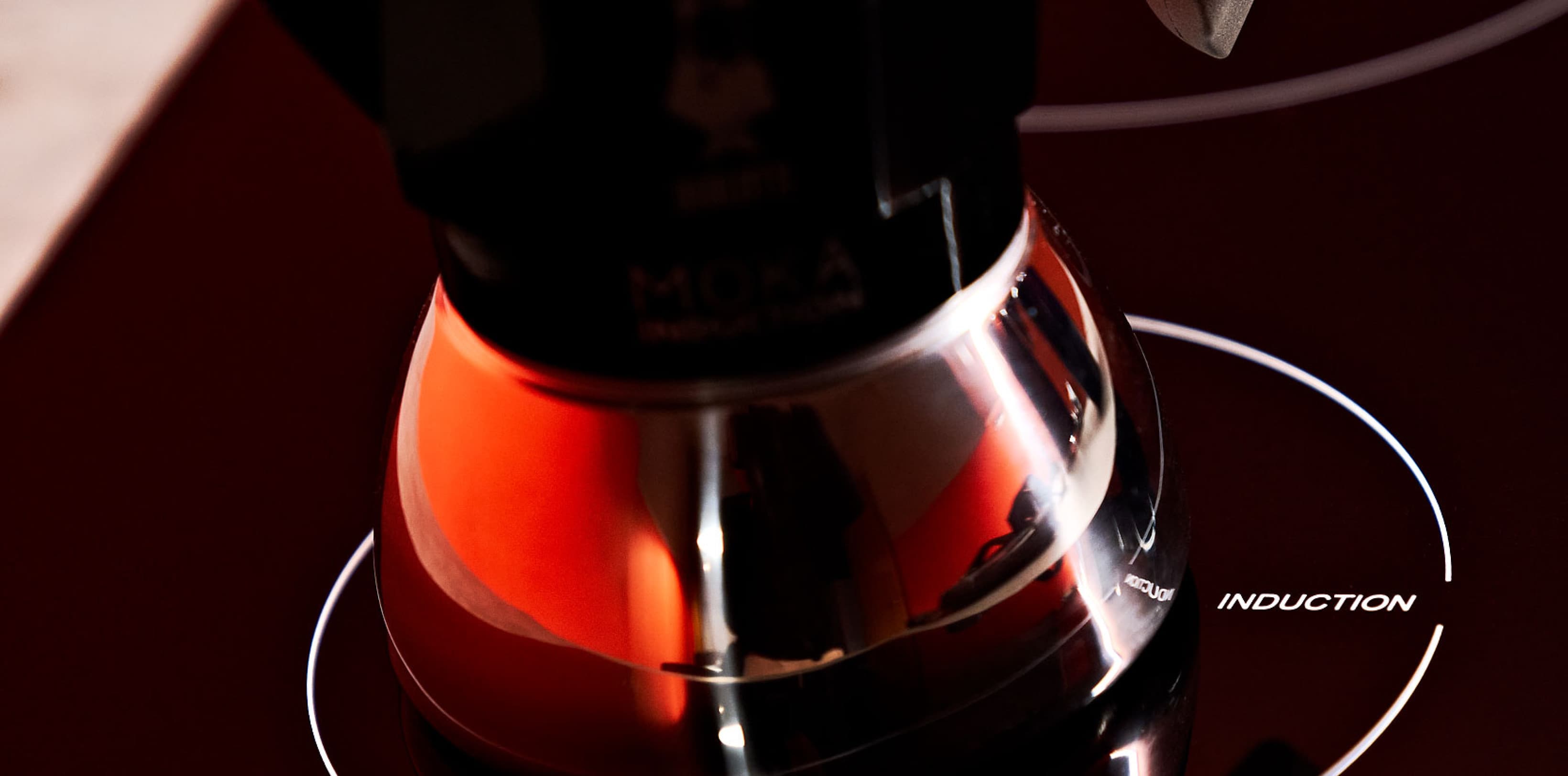 Detail picture of a typical iatlian coffee cooker on a stovetop.