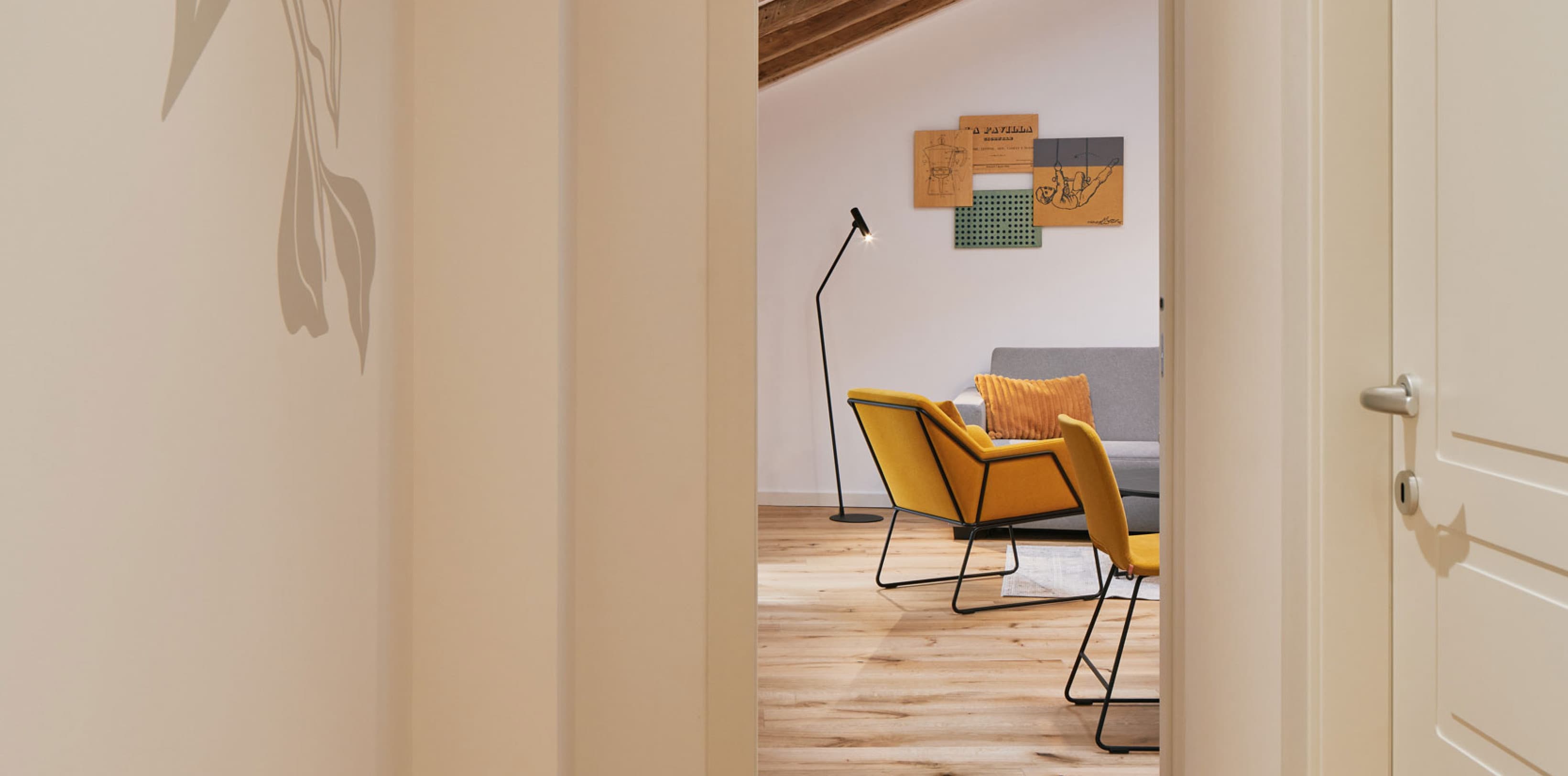 The hallway leads to the living room and bathroom to thr right side.