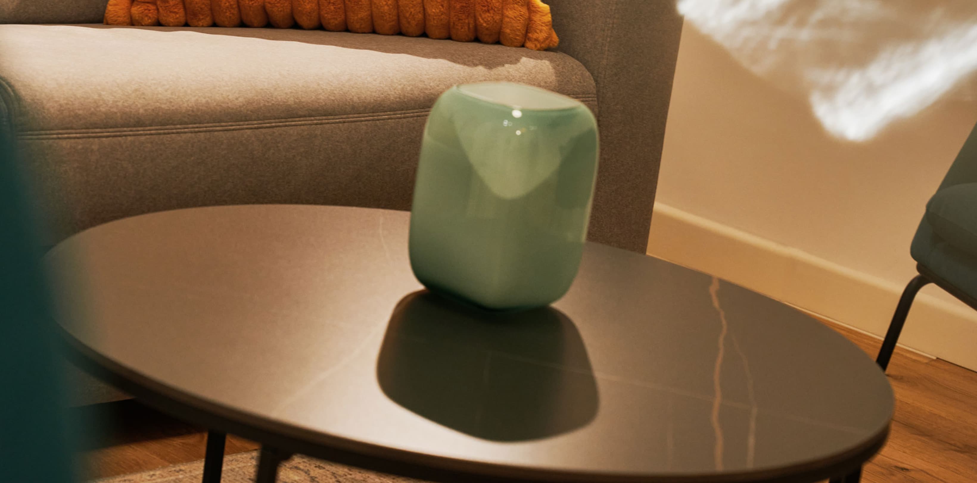 Seen is a detailed picture of the living room at the Spacy studio and the couch, which can be turned into an addtional bed.