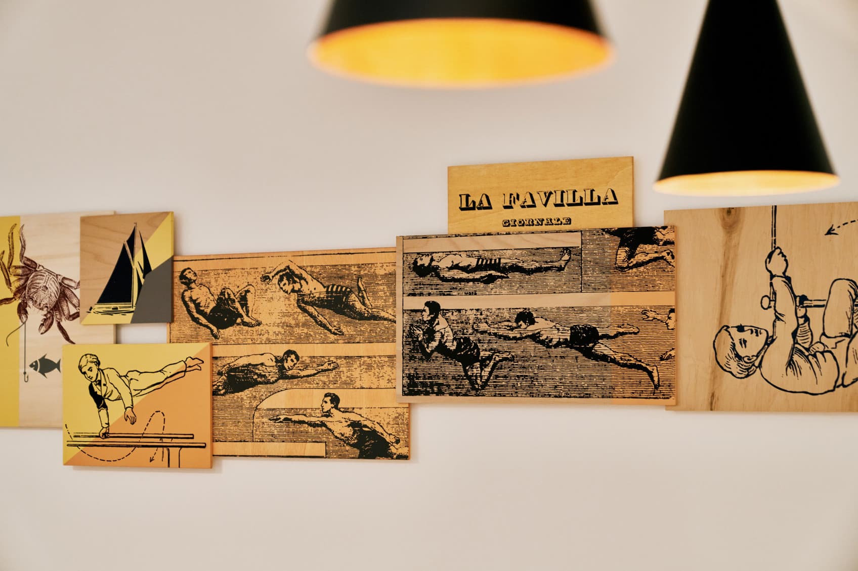 Sono esposte le opere d'arte appese nello studio Spacy, che raffigurano diversi sport, ispirate al nome dello studio "Ginnastica".